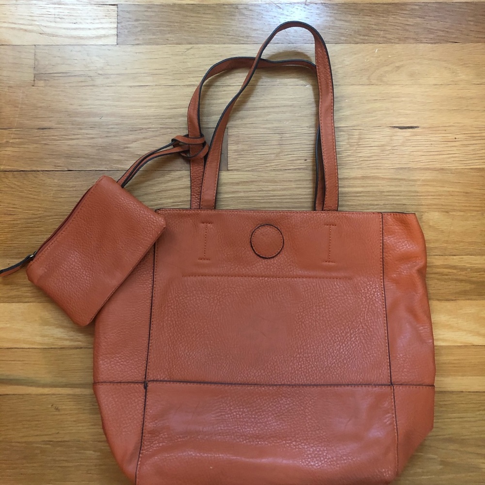 Joy Susan orange bag with wristlet